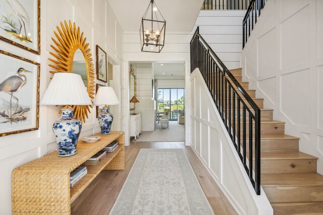 14600 Kiawah, Malakoff, TX 75148 - foyer with stairway, wood finished floors, and a notable chandelier