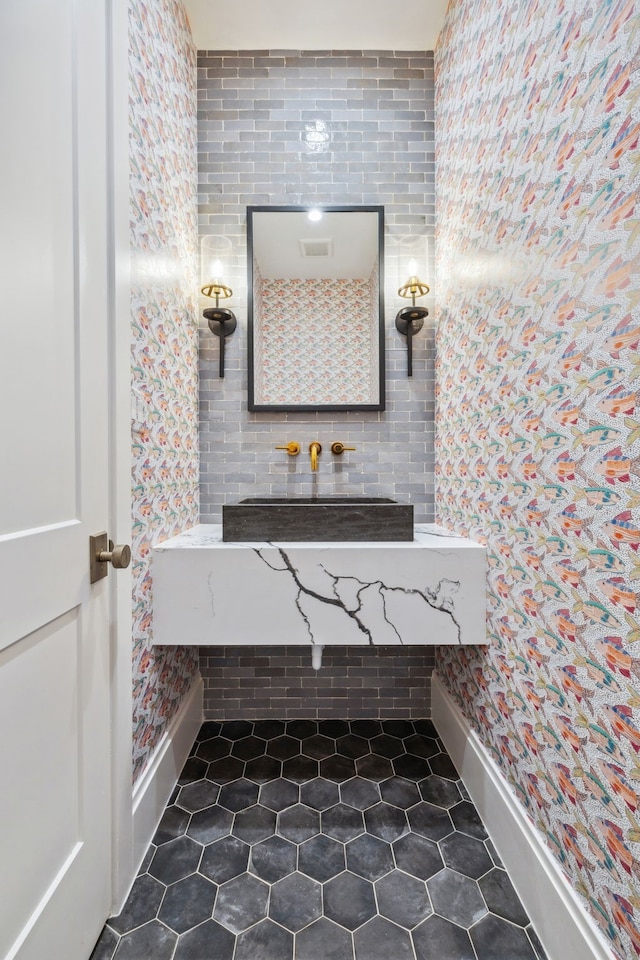 14600 Kiawah, Malakoff, TX 75148 - bathroom with tile patterned floors, a sink, visible vents, and baseboards