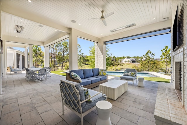 14600 Kiawah, Malakoff, TX 75148 - view of patio / terrace with an outdoor pool, outdoor dining space, visible vents, a ceiling fan, and an outdoor living space