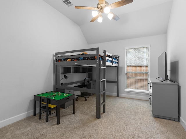 carpeted bedroom with lofted ceiling, visible vents, ceiling fan, and baseboards