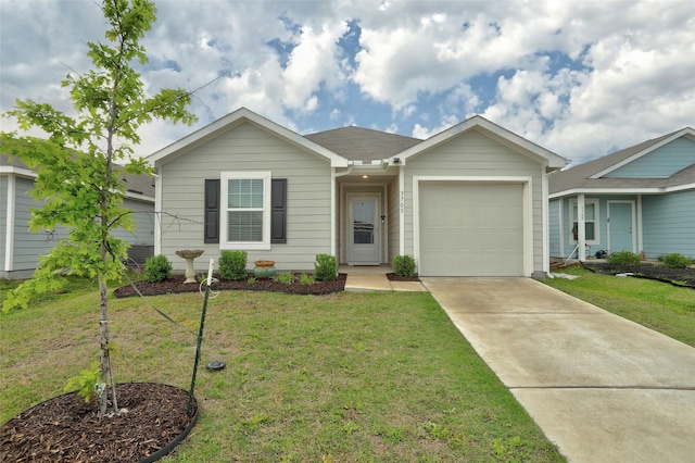 ranch-style home with a front lawn, concrete driveway, and an attached garage