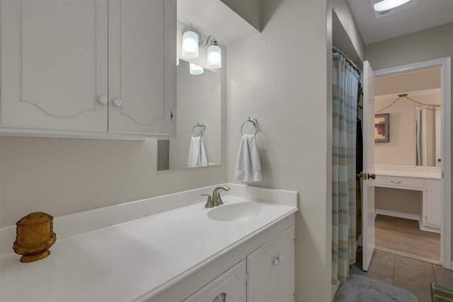 bathroom with vanity, tile patterned floors, and a shower with shower curtain