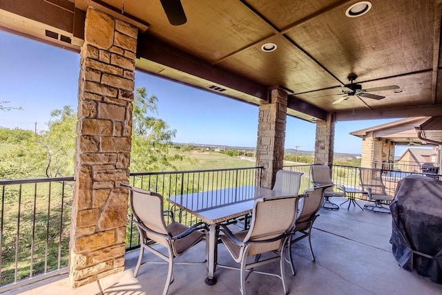 view of patio / terrace with ceiling fan and visible vents
