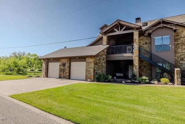 view of front of home featuring a chimney, a front lawn, stairs, and stone siding