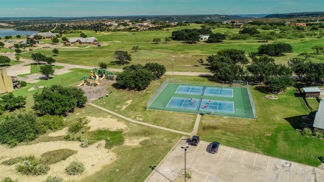 bird's eye view with golf course view and a water view
