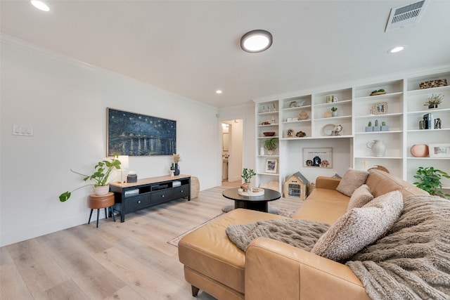 living room with recessed lighting, light wood finished floors, crown molding, visible vents, and baseboards