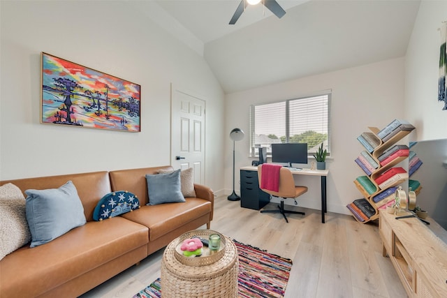 office area with a ceiling fan, light wood-style flooring, and lofted ceiling