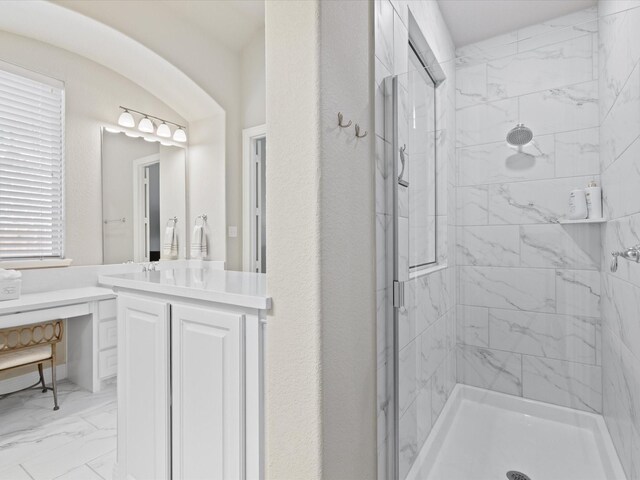 14840 Gentry Dr, Aledo, TX 76008 - bathroom featuring a shower stall, marble look tile flooring, and vanity