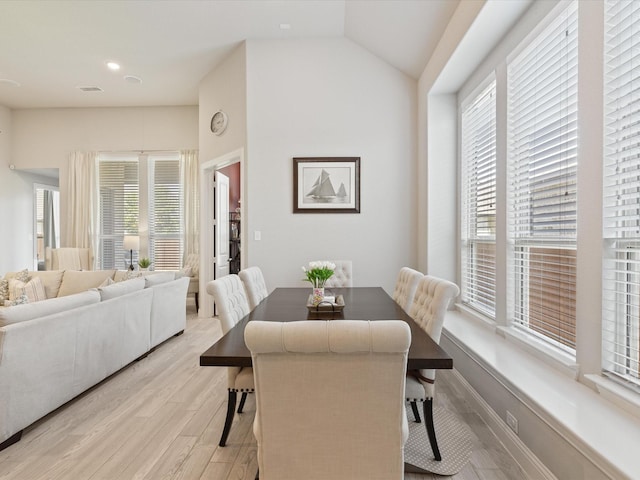 14840 Gentry Dr, Aledo, TX 76008 - dining space featuring light wood finished floors, plenty of natural light, vaulted ceiling, and recessed lighting
