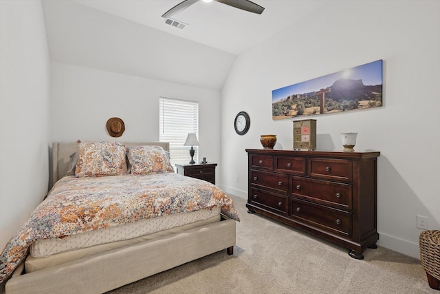 bedroom with light colored carpet, vaulted ceiling, ceiling fan, baseboards, and visible vents