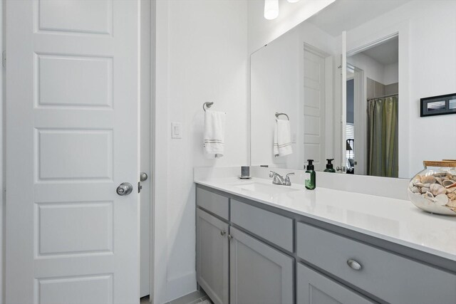 full bathroom featuring vanity