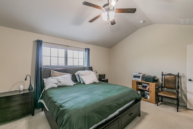 bedroom featuring a ceiling fan, visible vents, vaulted ceiling, and light carpet