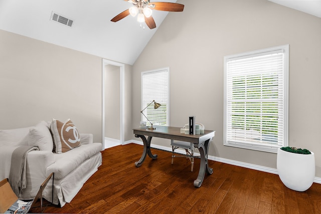home office featuring high vaulted ceiling, a ceiling fan, visible vents, baseboards, and wood finished floors