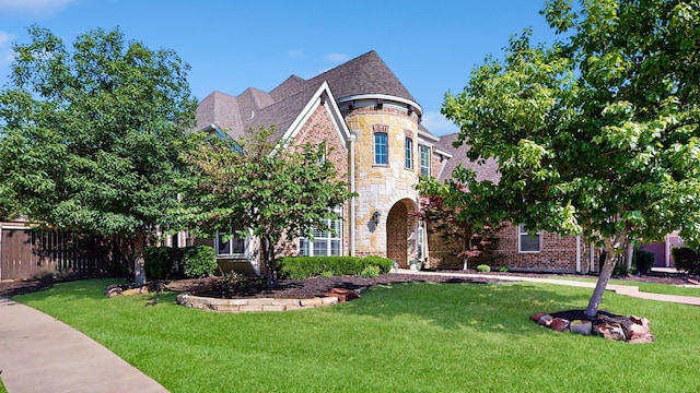 139 Townlake Dr, Prosper, TX 75078 - view of front facade with brick siding, stone siding, and roof with shingles