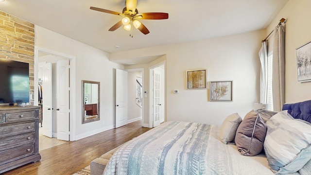 139 Townlake Dr, Prosper, TX 75078 - bedroom with light wood-type flooring, a ceiling fan, and baseboards