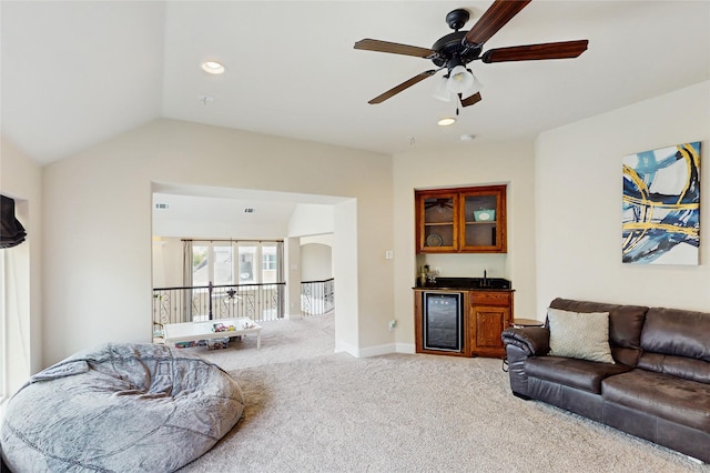 139 Townlake Dr, Prosper, TX 75078 - living room featuring wet bar, light carpet, ceiling fan, wine cooler, and baseboards