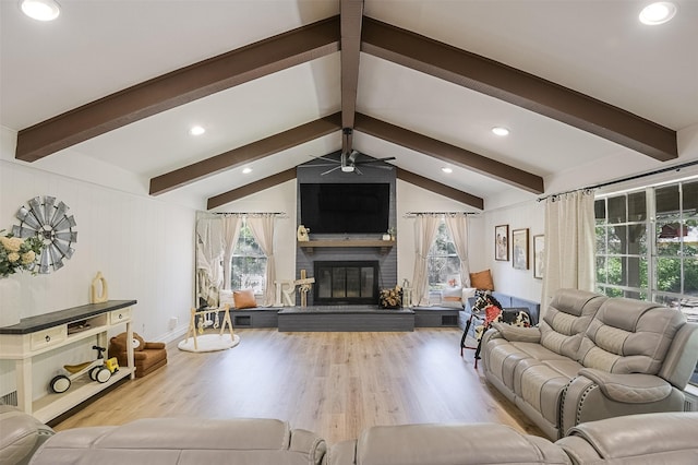 living area featuring recessed lighting, wood finished floors, ceiling fan, and a fireplace
