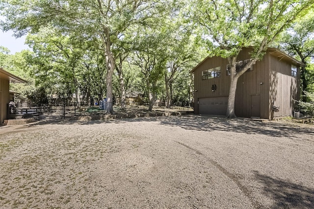 view of yard featuring a garage