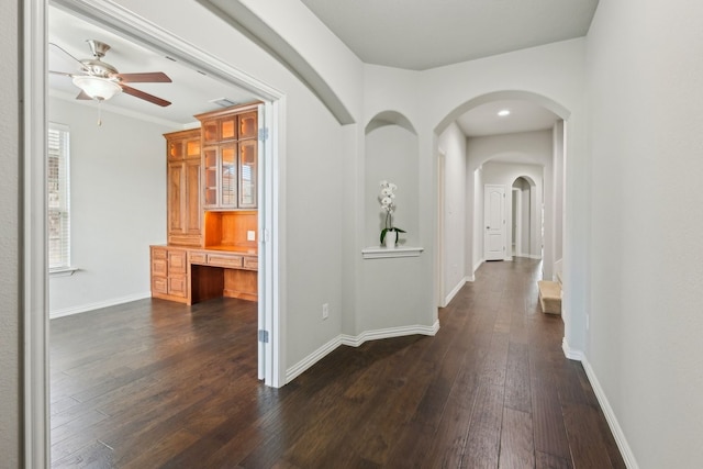 6500 Roaring Crk, Denton, TX 76226 - hall with an office area, dark wood finished floors, baseboards, and arched walkways
