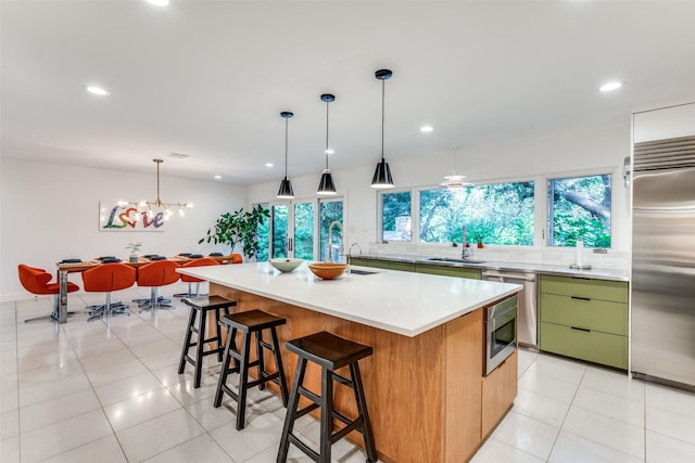 416 Crestwood Dr, Fort Worth, TX 76107 - kitchen with built in appliances, recessed lighting, a healthy amount of sunlight, and light countertops