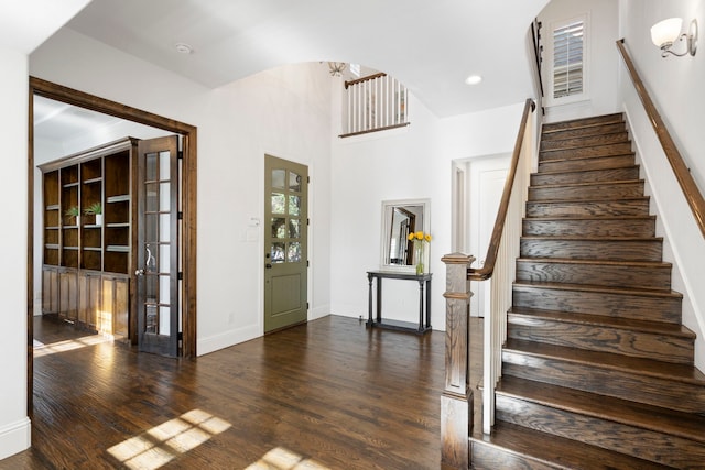 2200 Whitman Ln, Carrollton, TX 75010 - stairs with a chandelier, wood finished floors, baseboards, french doors, and recessed lighting
