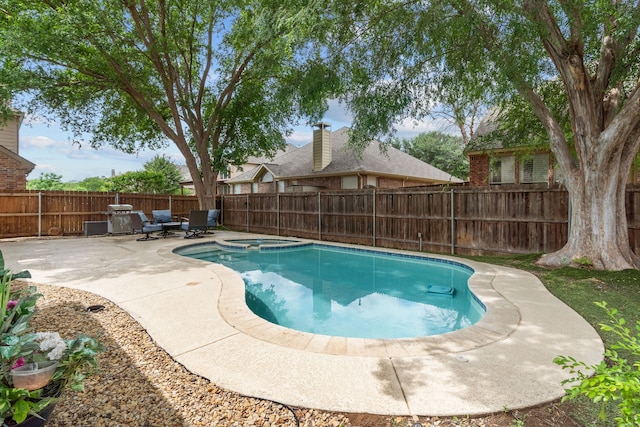 2209 Graystone Ct, Keller, TX 76248 - view of swimming pool with a patio, a fenced backyard, and a pool with connected hot tub