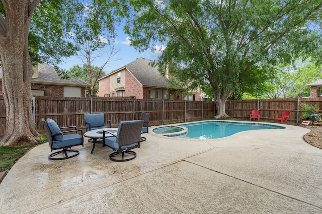2209 Graystone Ct, Keller, TX 76248 - view of swimming pool with a patio, a fenced backyard, and a pool with connected hot tub