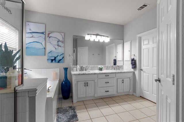 2209 Graystone Ct, Keller, TX 76248 - bathroom with tile patterned flooring, double vanity, and a bath