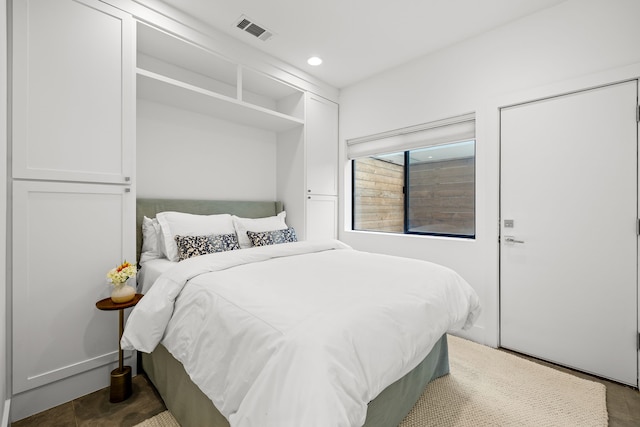 bedroom featuring visible vents and recessed lighting