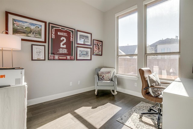 home office featuring wood finished floors and baseboards