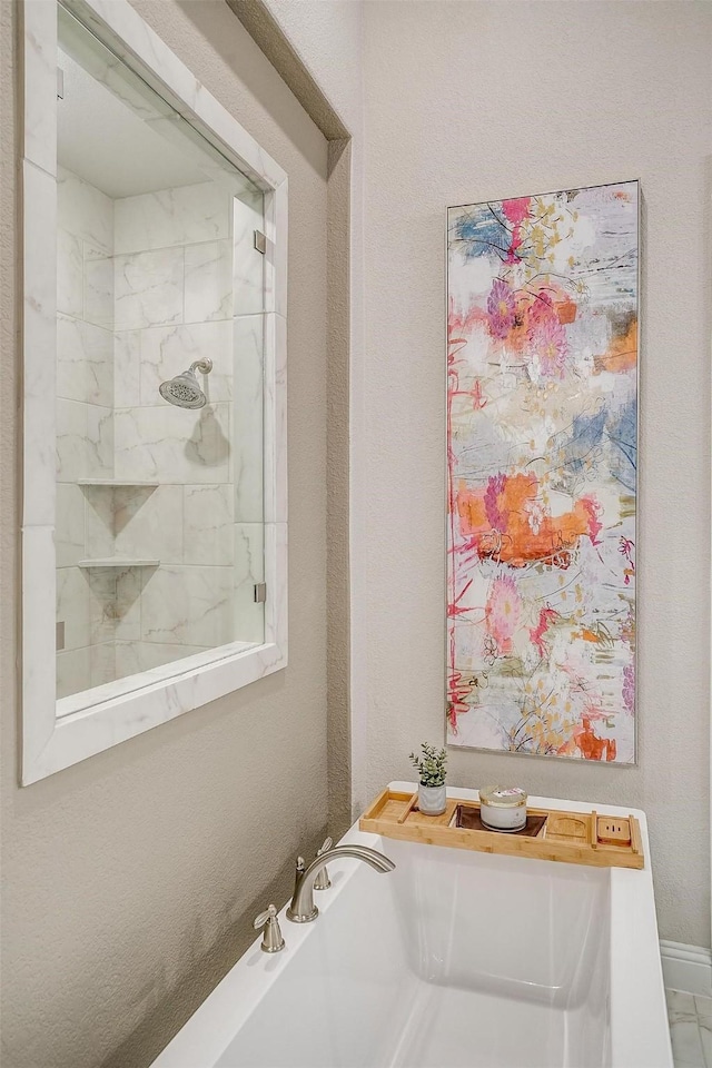 full bath featuring a bath