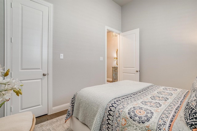 bedroom featuring baseboards
