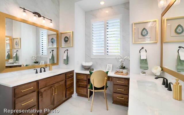 bathroom with two vanities and a sink