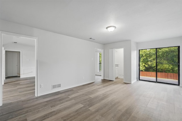 829 Hunters Creek Dr, Desoto, TX 75115 - empty room featuring baseboards, visible vents, and wood finished floors