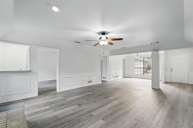 829 Hunters Creek Dr, Desoto, TX 75115 - unfurnished living room featuring visible vents, light wood finished floors, and ceiling fan with notable chandelier