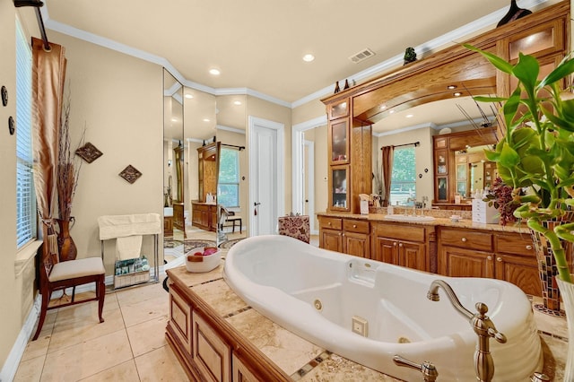 full bath with visible vents, a whirlpool tub, ornamental molding, tile patterned floors, and vanity