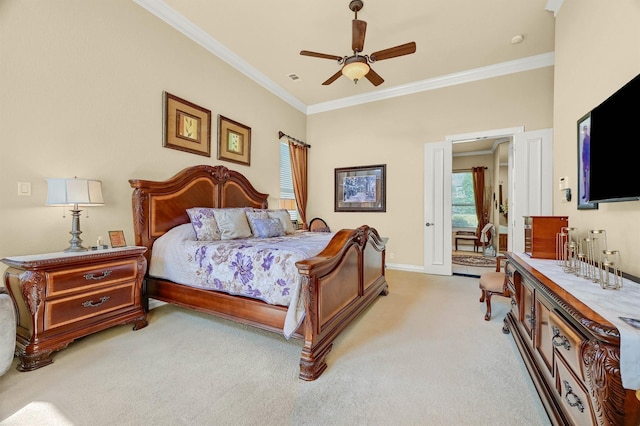 bedroom with baseboards, ornamental molding, a ceiling fan, and light colored carpet