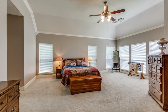 bedroom featuring baseboards, ornamental molding, vaulted ceiling, and light carpet