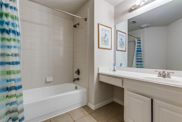 bathroom with visible vents, baseboards, shower / bath combo with shower curtain, tile patterned floors, and vanity