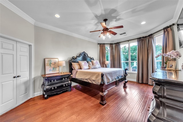 3040 N Camino Lagos, Grand Prairie, TX 75054 - bedroom featuring ornamental molding, visible vents, wood finished floors, and baseboards