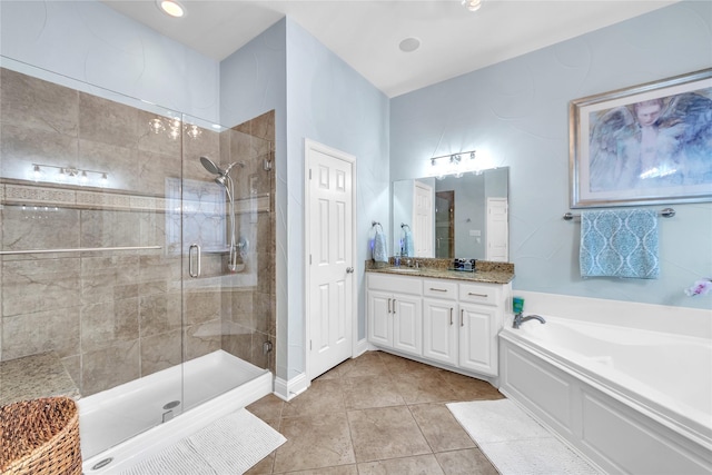 3040 N Camino Lagos, Grand Prairie, TX 75054 - bathroom featuring vanity, a garden tub, a shower stall, and tile patterned flooring