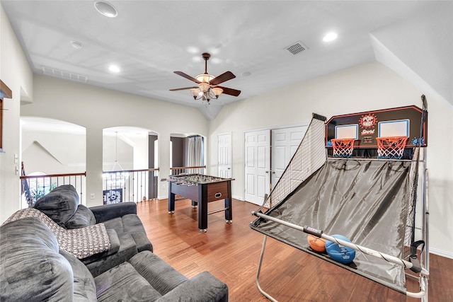 3040 N Camino Lagos, Grand Prairie, TX 75054 - playroom featuring recessed lighting, arched walkways, wood finished floors, ceiling fan, and visible vents