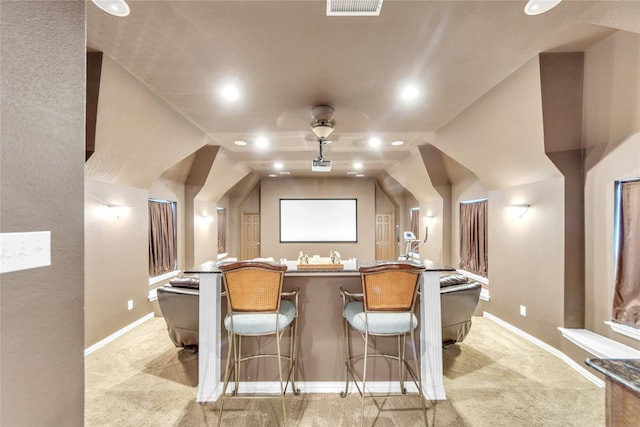 3040 N Camino Lagos, Grand Prairie, TX 75054 - cinema room featuring lofted ceiling, light colored carpet, and baseboards