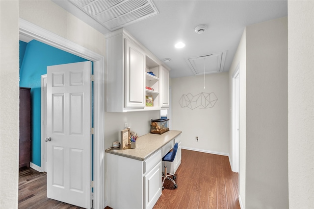 3040 N Camino Lagos, Grand Prairie, TX 75054 - hallway with attic access, visible vents, wood finished floors, and baseboards