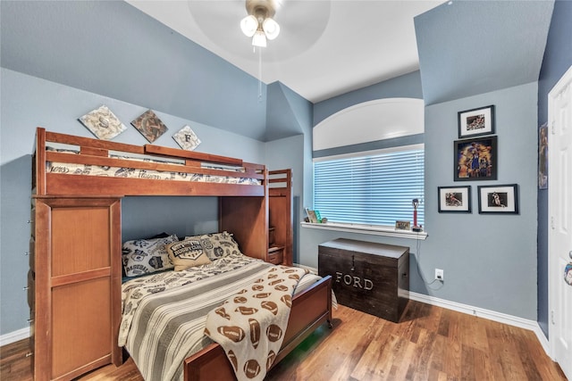 3040 N Camino Lagos, Grand Prairie, TX 75054 - bedroom with baseboards, wood finished floors, and a ceiling fan