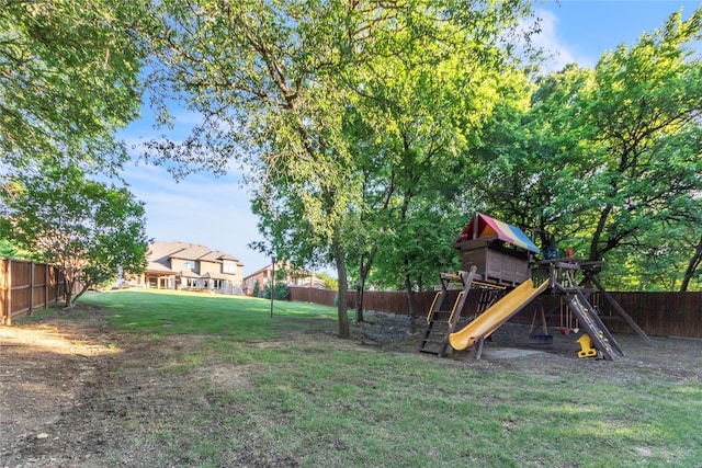 3040 N Camino Lagos, Grand Prairie, TX 75054 - view of playground featuring a lawn and fence