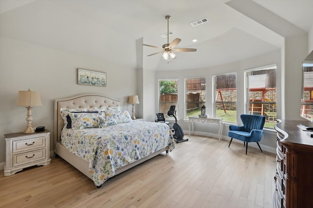bedroom featuring visible vents, a ceiling fan, light wood finished floors, and baseboards