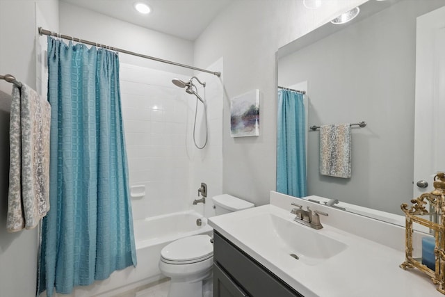 full bathroom with toilet, shower / tub combo, and vanity