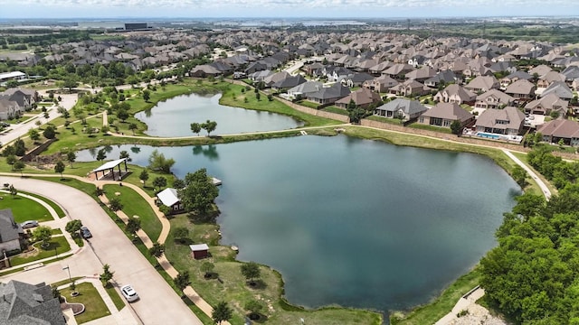 aerial view with a residential view and a water view