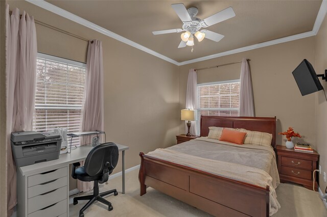 bedroom with light colored carpet, ceiling fan, ornamental molding, and baseboards